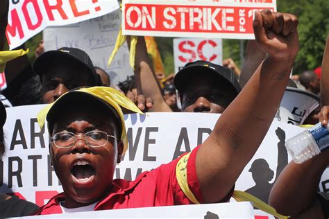 Workers rally for better pay and conditions on May Day
